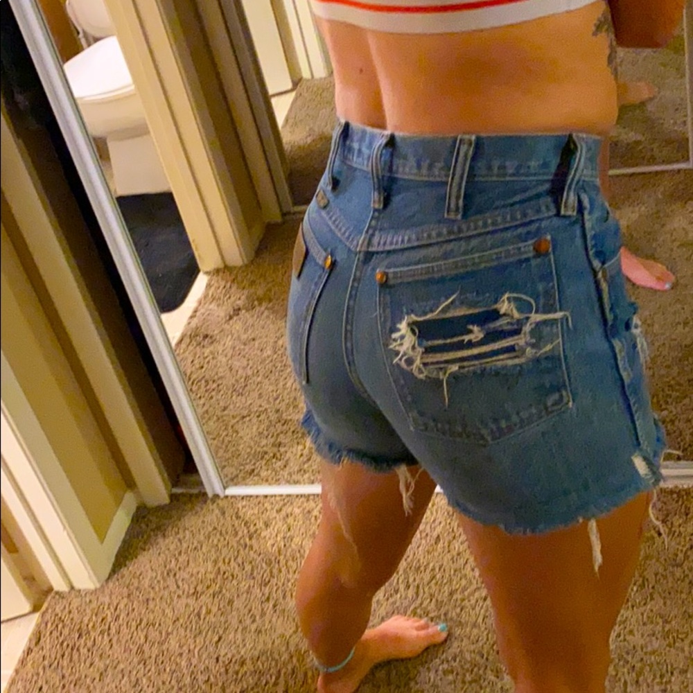 DISTRESSED WRANGLER SHORTS